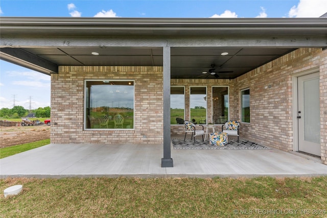 view of patio with a ceiling fan