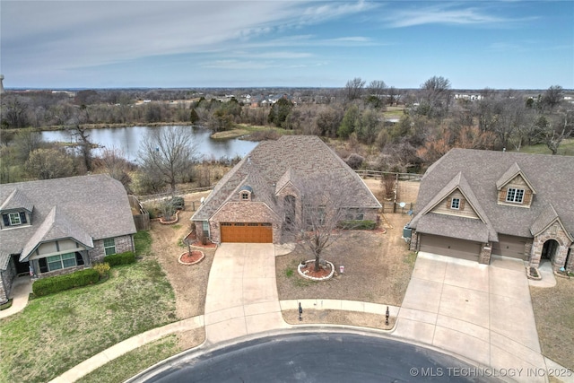 aerial view featuring a water view