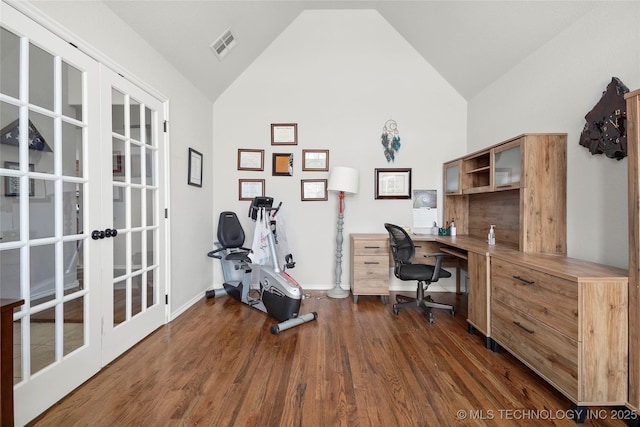 office space featuring visible vents, baseboards, dark wood finished floors, french doors, and high vaulted ceiling