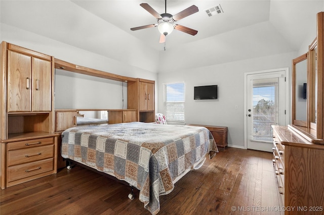 bedroom with visible vents, dark wood-type flooring, a ceiling fan, access to exterior, and vaulted ceiling