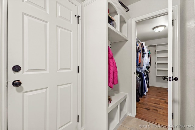 mudroom with light tile patterned floors