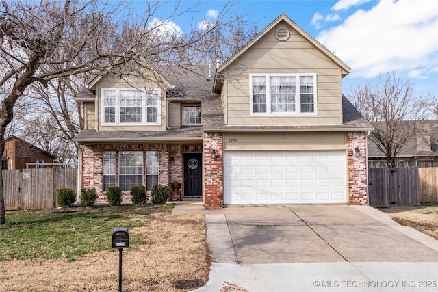 traditional home featuring driveway, brick siding, an attached garage, and fence