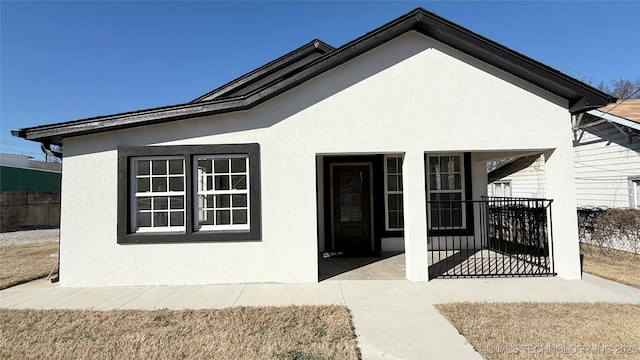 view of front of home with stucco siding