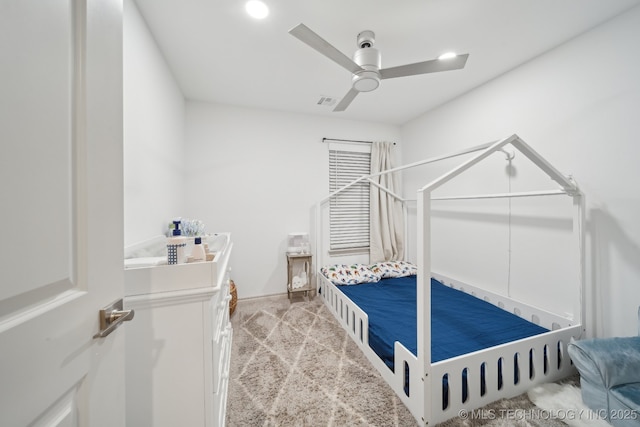 bedroom with recessed lighting, a ceiling fan, and light colored carpet