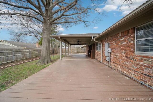 deck featuring fence and ceiling fan