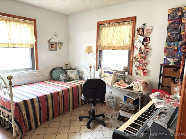 bedroom with a textured ceiling