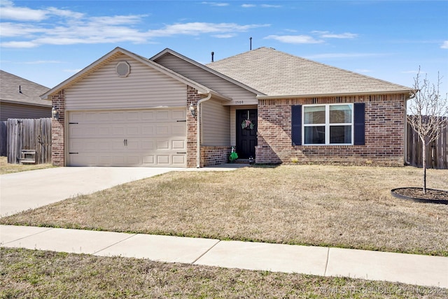 ranch-style home featuring brick siding, an attached garage, concrete driveway, and fence