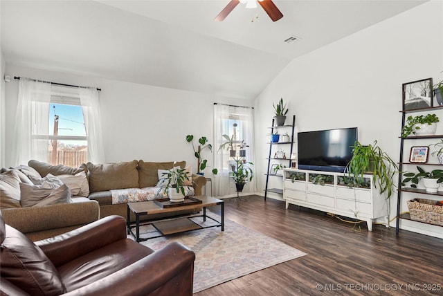 living room featuring visible vents, a ceiling fan, lofted ceiling, and wood finished floors