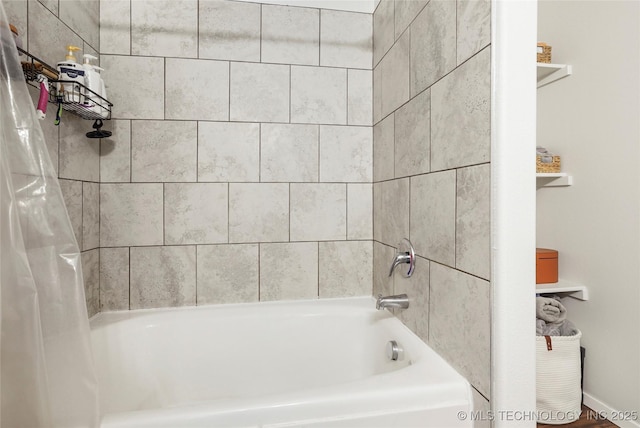 bathroom with shower / tub combo