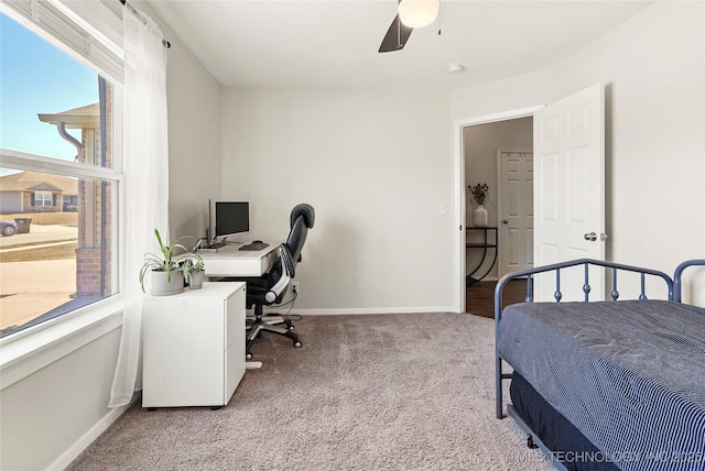 bedroom with baseboards, a ceiling fan, and carpet flooring