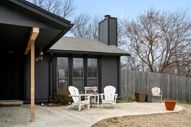 view of patio with fence