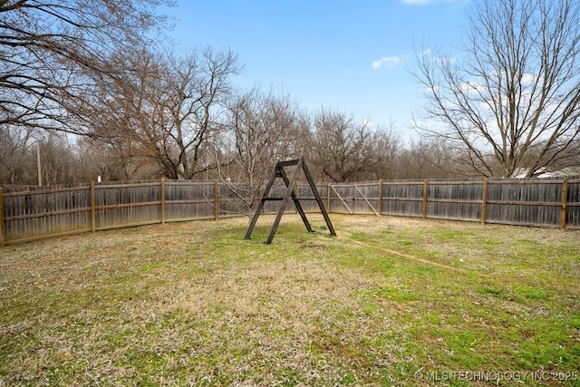 view of yard with a fenced backyard