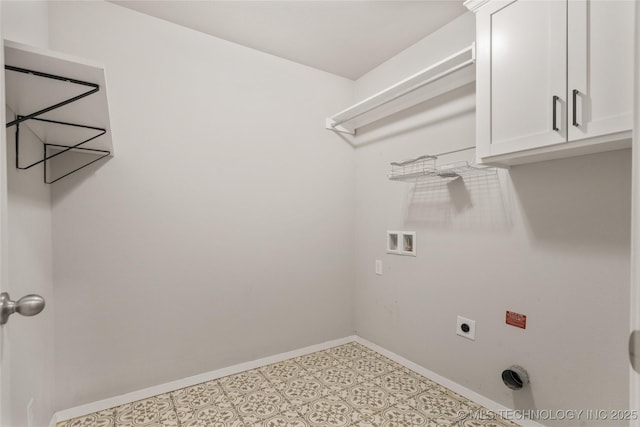 laundry area featuring cabinet space, hookup for a washing machine, baseboards, and hookup for an electric dryer