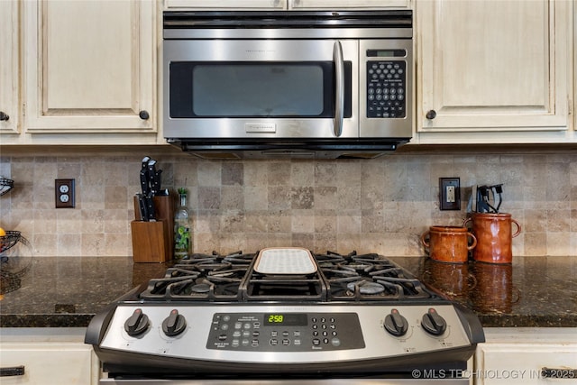 kitchen featuring tasteful backsplash and appliances with stainless steel finishes