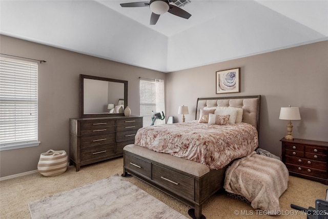 bedroom featuring vaulted ceiling, baseboards, and ceiling fan