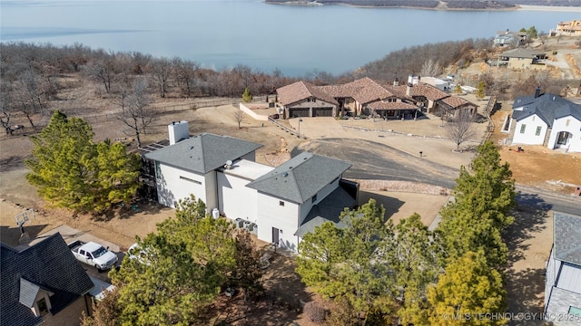 bird's eye view with a water view and a residential view