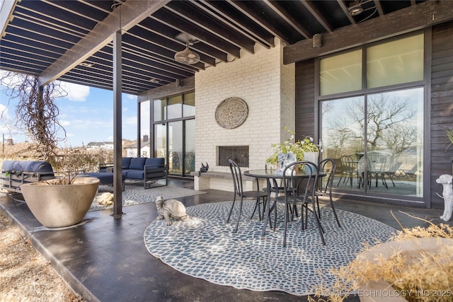 view of patio / terrace featuring outdoor dining area, outdoor lounge area, grilling area, and a pergola