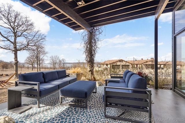 view of patio / terrace with fence and an outdoor living space