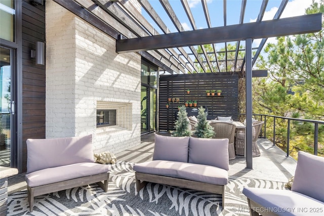 view of patio / terrace featuring an outdoor hangout area and a pergola