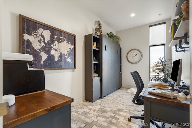 office with brick floor and recessed lighting