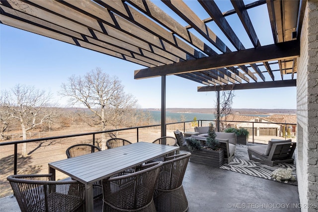 view of patio with a pergola and outdoor dining space