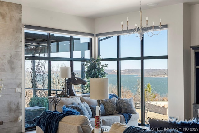 living area featuring an inviting chandelier