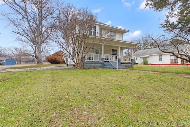 view of front of house with covered porch, a chimney, and a front yard