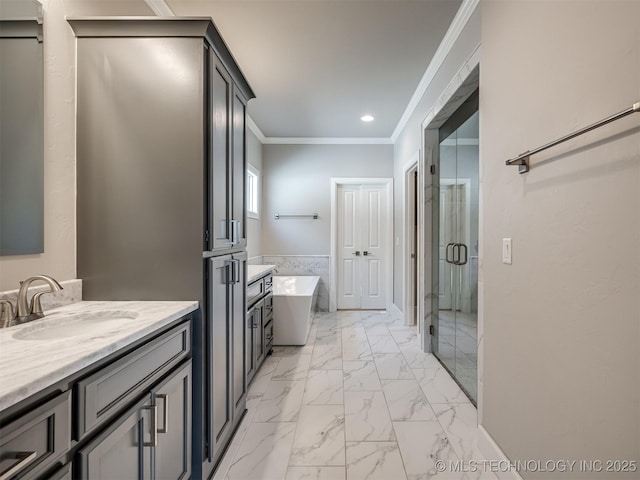 bathroom with a soaking tub, ornamental molding, marble finish floor, vanity, and a shower stall