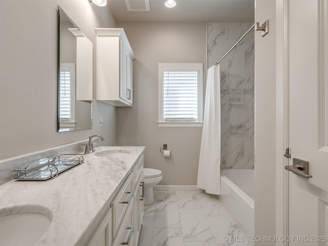 bathroom with marble finish floor, visible vents, toilet, a sink, and baseboards