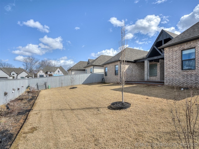 view of yard featuring a fenced backyard