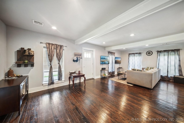 living area with visible vents, baseboards, wood-type flooring, beamed ceiling, and recessed lighting