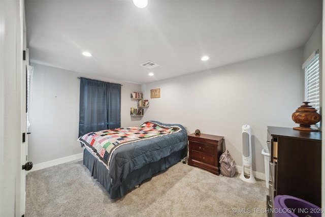 carpeted bedroom with recessed lighting, visible vents, and baseboards