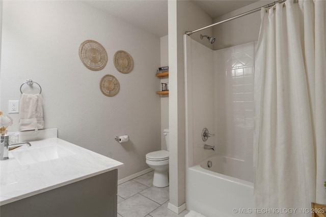 bathroom featuring toilet, shower / tub combo, vanity, tile patterned flooring, and baseboards