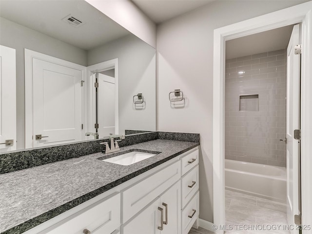 11225 S Fir Ave W, Jenks, OK 74037 - bathroom with shower / bath combination, vanity, and visible vents
