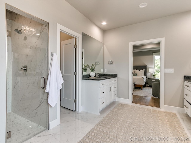 11225 S Fir Ave W, Jenks, OK 74037 - ensuite bathroom with ensuite bathroom, vanity, baseboards, marble finish floor, and a marble finish shower