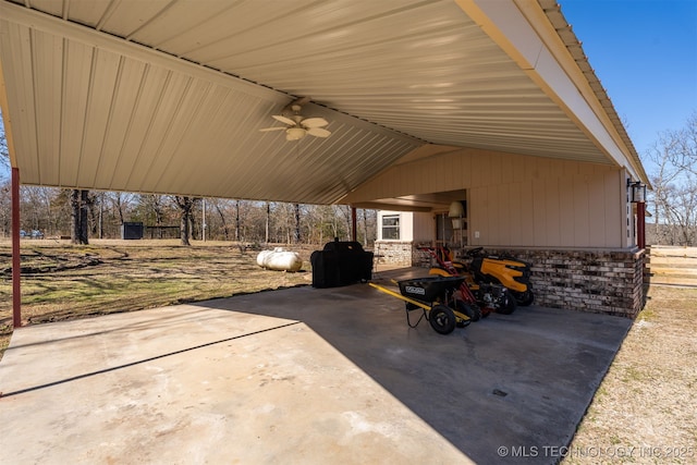 view of patio / terrace featuring an attached carport