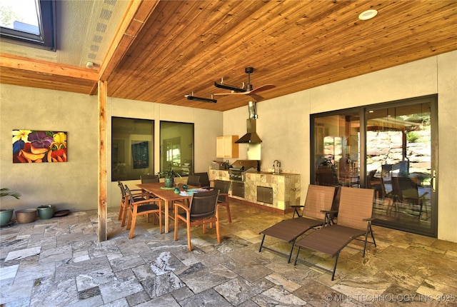 8890 S 39th W Ave, Tulsa, OK 74132 - view of patio featuring area for grilling, outdoor dining space, and a ceiling fan