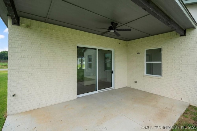 view of patio featuring a ceiling fan