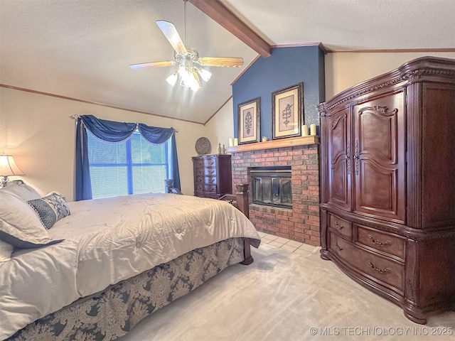 bedroom featuring vaulted ceiling with beams, a textured ceiling, light carpet, a fireplace, and a ceiling fan