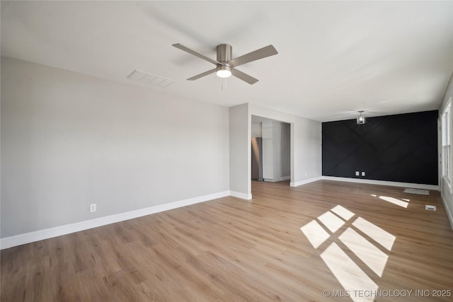 8301 E 133rd St S, Bixby, OK 74008 - interior space featuring light wood-style floors, baseboards, ceiling fan, and visible vents