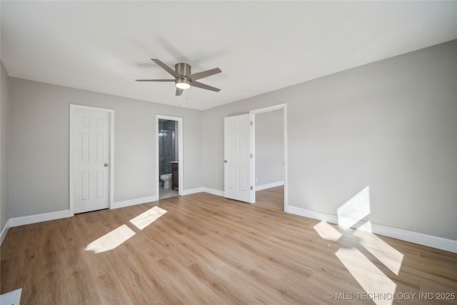 8301 E 133rd St S, Bixby, OK 74008 - unfurnished bedroom featuring baseboards, ceiling fan, and light wood finished floors