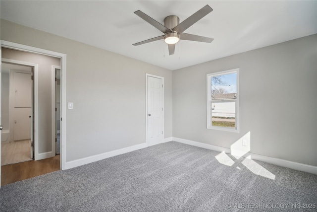 8301 E 133rd St S, Bixby, OK 74008 - unfurnished bedroom featuring carpet flooring, baseboards, and ceiling fan