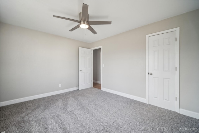 8301 E 133rd St S, Bixby, OK 74008 - unfurnished bedroom with baseboards, carpet, and a ceiling fan