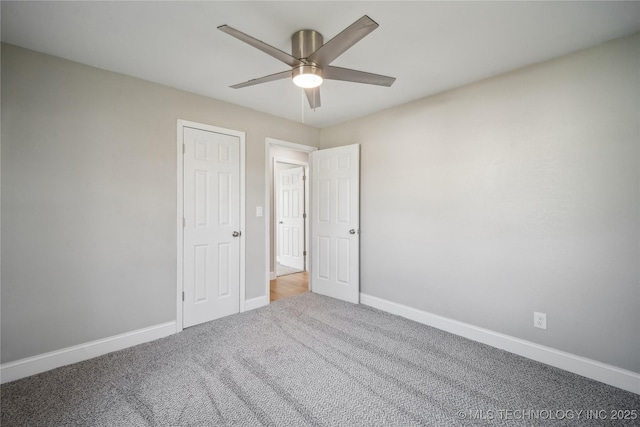 8301 E 133rd St S, Bixby, OK 74008 - unfurnished bedroom with baseboards, a ceiling fan, and carpet flooring