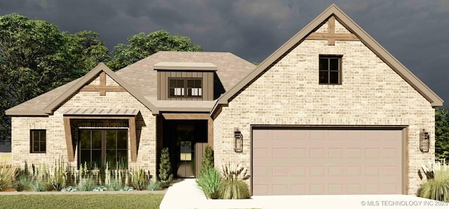 view of front of property featuring a garage, driveway, and brick siding