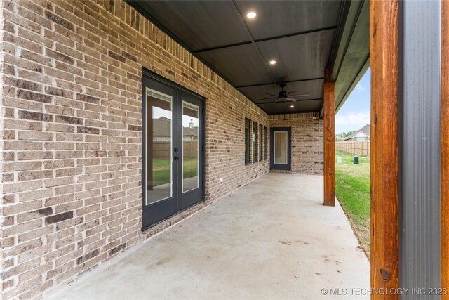view of patio with a ceiling fan and french doors