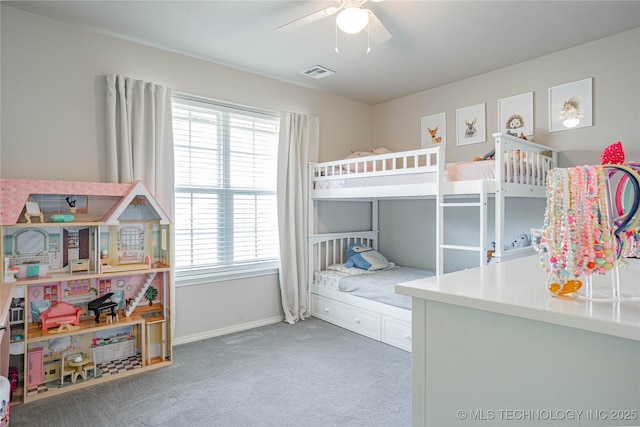 bedroom featuring ceiling fan, carpet flooring, visible vents, and baseboards