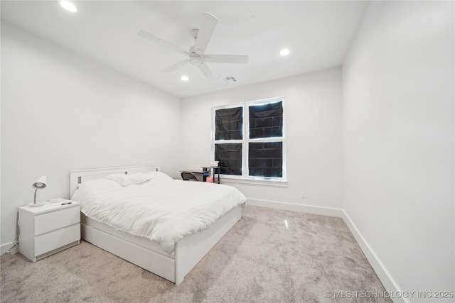 carpeted bedroom with visible vents, baseboards, a ceiling fan, and recessed lighting