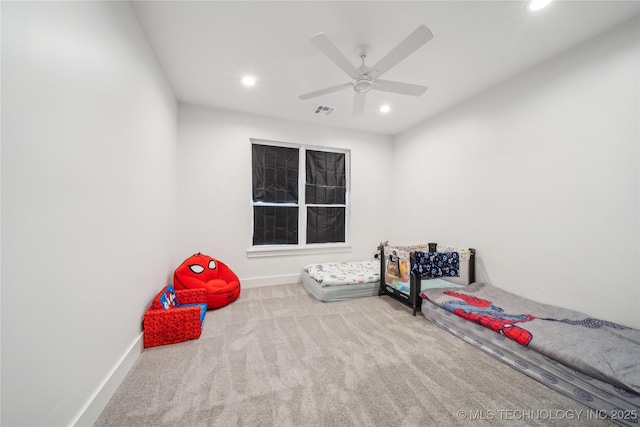 carpeted bedroom featuring baseboards, a ceiling fan, visible vents, and recessed lighting