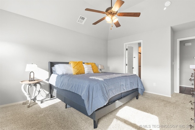 carpeted bedroom with a ceiling fan, visible vents, and baseboards